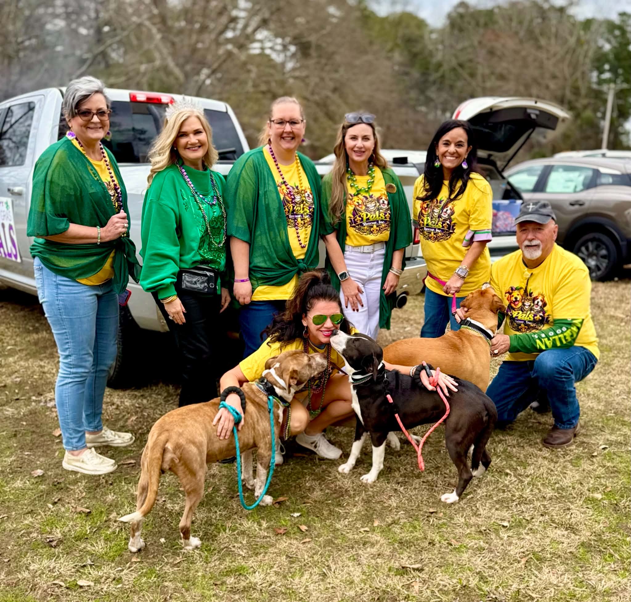 PALS Rescue volunteers with an adopted rescue dog on adoption day in McComb, Mississippi